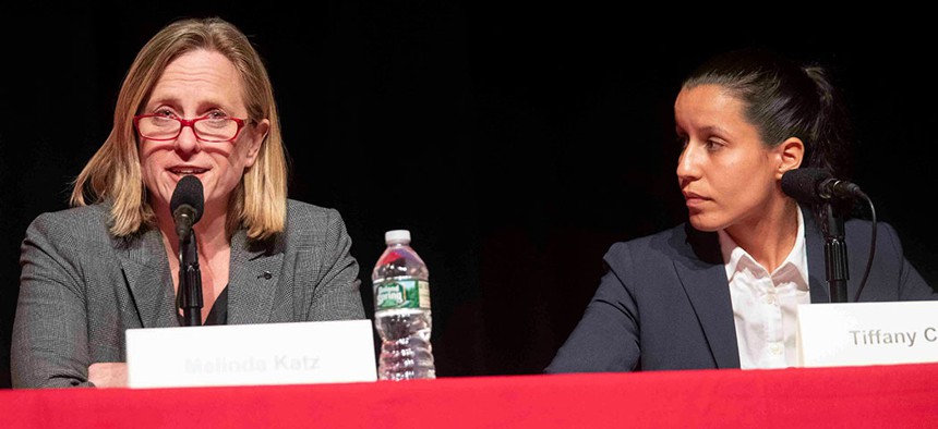 Public defender Tiffany Caban listens as Queens borough President Melinda Katz speaks during a Queens District Attorney candidates forum at St. John's University.