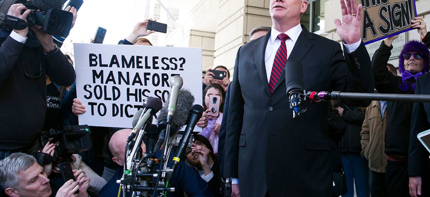 Keven Downing, Paul Manafort's attorney leaves federal court after Manafort's sentencing hearing in Washington, where Manafort was sentenced to an additional three and a half years of prison.