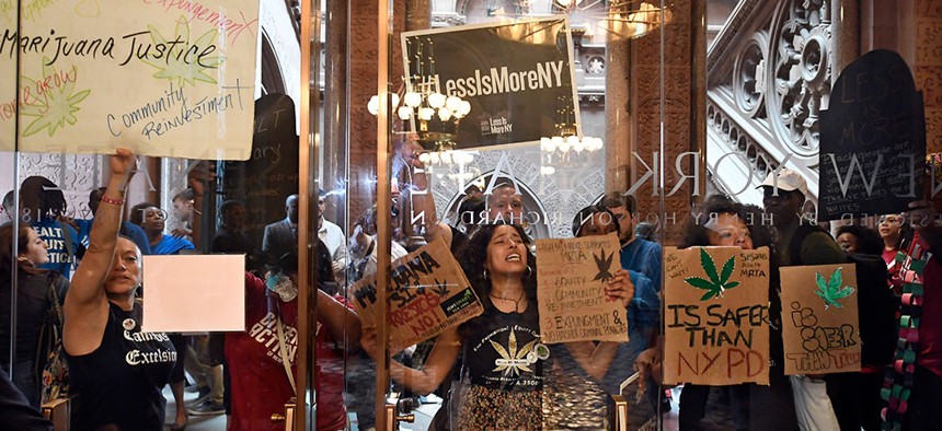 Protesters in Albany pushing New York legislators to pass marijuana legalization.