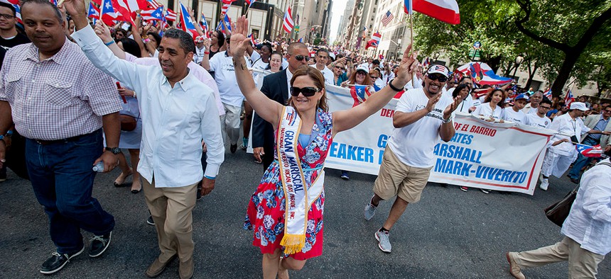 Former New York City Council Speaker Melissa Mark-Mark Viverito marches in the 2014 Puerto Rican Day parade.