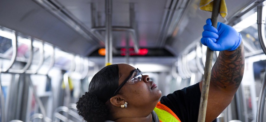 An MTA worker sanitizing a subway car in early March.