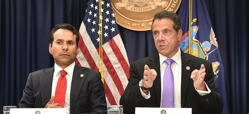 Director of the Budget Robert Mujica and Gov. Andrew Cuomo.