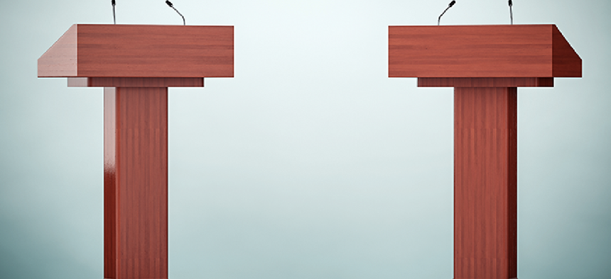 two empty debate podiums
