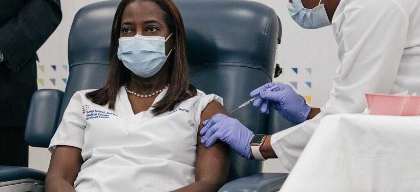 Nurse Sandra Lindsay is the first New Yorker to receive a federally approved COVID-19 vaccine