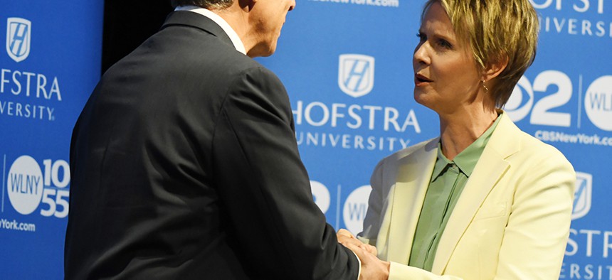 Andrew Cuomo and Cynthia Nixon shake hands at the end of their first New York gubernatorial debate..