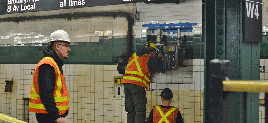 New York City Subway workers repairing a Subway station.