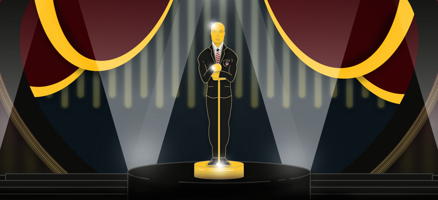 An Oscar statuette dressed as a politician