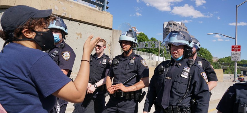 As protests over the murder of George Floyd rage on, the NYPD are increasing the risk  for both protestors and themselves but not wearing masks.