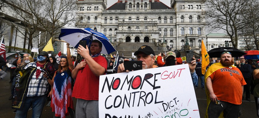 Protesters urge New York Gov. Andrew Cuomo to Reopen New York during a rally at the New York state Capitol on May 1, 2020.