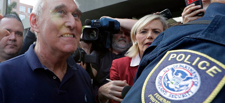 Roger Stone leaves the federal courthouse following his arrest for lying to Congress and obstructing the special counsel's Russia investigation.