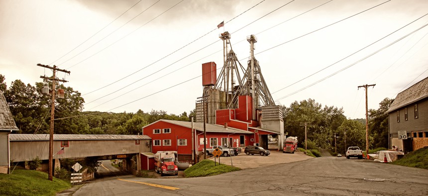 View of main street and rural grain mill in small western New York town.
