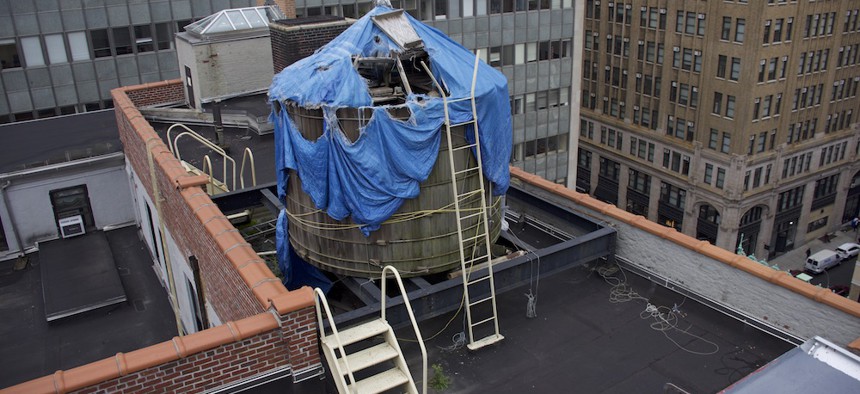 The drinking water supply for offices of the New York City Department of Sanitation doesn’t even have a roof – just a tattered tarp.