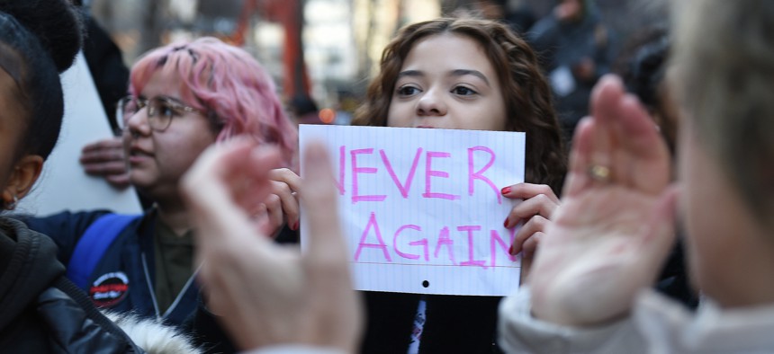 A student participating in a school walkout to protest gun violence in lower Manhattan on March 14, 2018