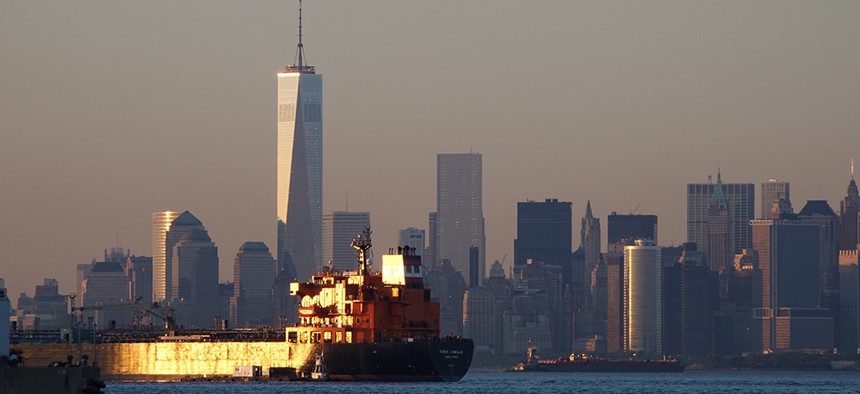 A cargo ship passing through New York City's harbor