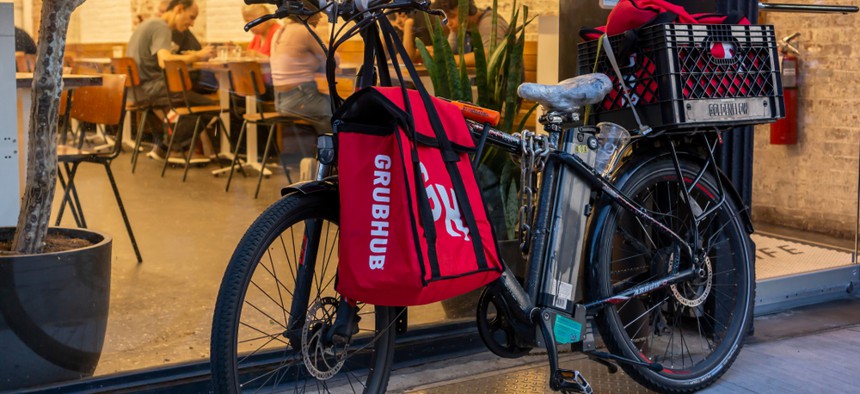 A bike with a GrubHub bag in New York City.