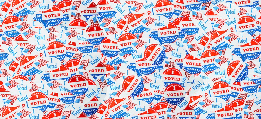 Countless "I voted" stickers in a pile