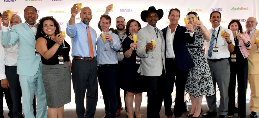 Bronx Borough President Ruben Diaz Jr., Democratic Chairman Marcos Crespo and other Bronx leaders toast the opening of FreshDirect's new facility in the South Bronx.