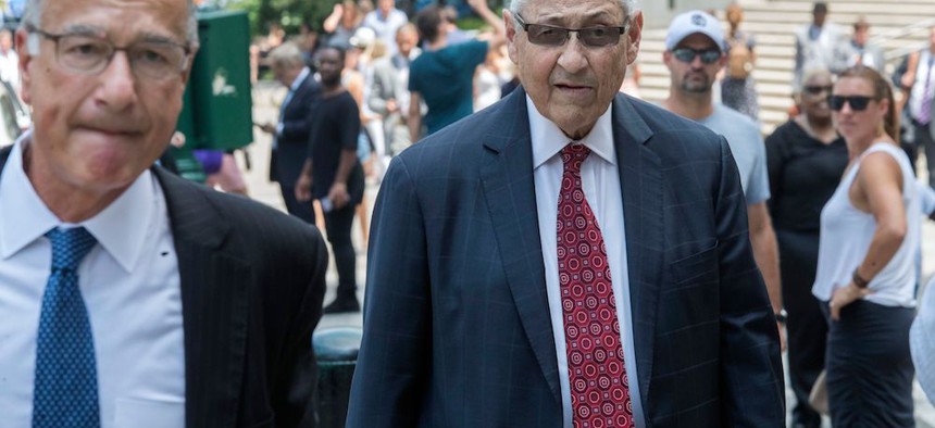Former Assembly Speaker Sheldon Silver, right, arrives at federal court in New York prior to being sentenced for a second time. 