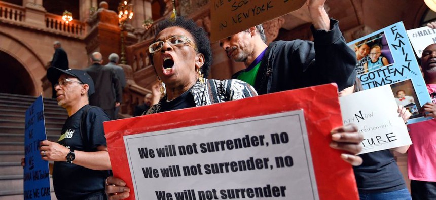 Protesters against solitary confinement at New York state correctional facilities, during a rally to urge New York state legislators to pass reform legislation at the state Capitol.