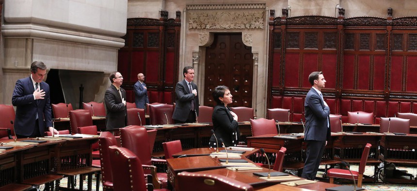 A scattering of state Senators on the Senate floor March 29th.