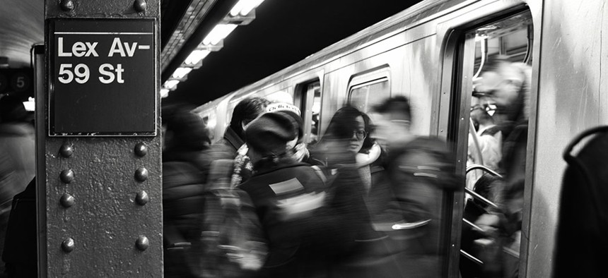 A crowded New York City subway station.