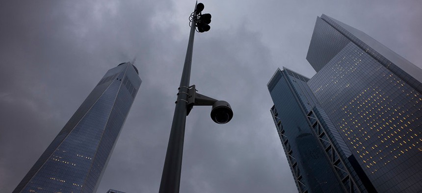 A light pole with a surveillance camera at the World Trade Center.