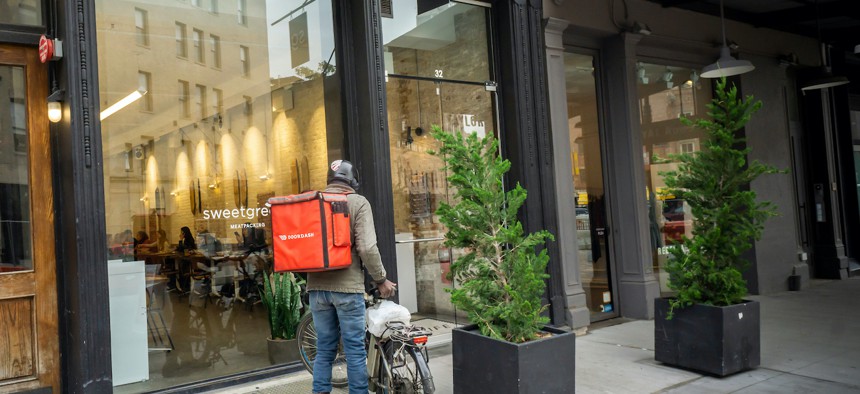 Doordash bike delivery person.