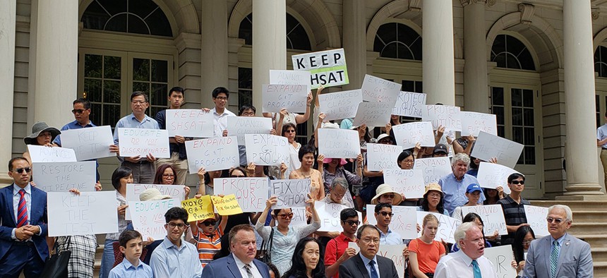 State Senator Tony Avella, New York City Councilman Bob Holden and the Chinese American Citizens Alliance hold a rally on the steps of City Hall to promote legislation to keep the SHSAT placement test in place.