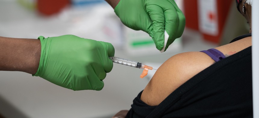 New Yorkers getting vaccinated at the Abyssinian Baptist Church in Harlem.