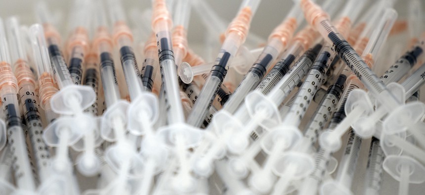 Vaccine syringes