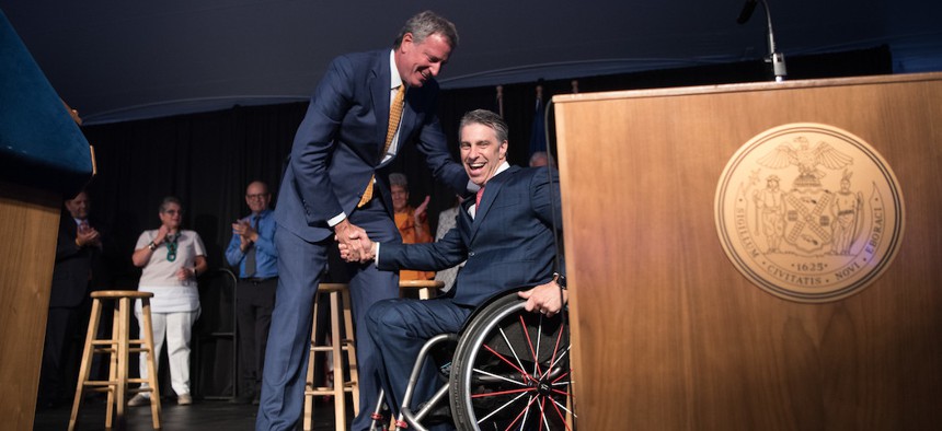 Mayor's Office for People with Disabilities Commissioner Victor Calise and Mayor Bill de Blasio host the Sapolin Awards at Gracie Mansion in 2017.