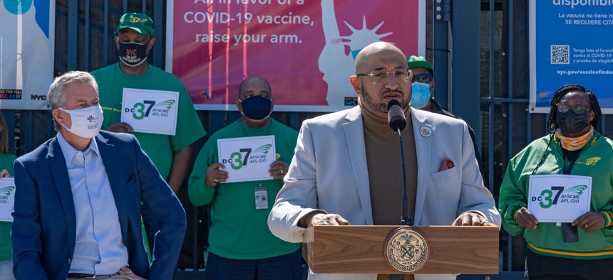 District Council 37 Executive Director Henry Garrido speaks at a mass vaccination site. He has backed Eric Adams to be New York City’s next mayor.