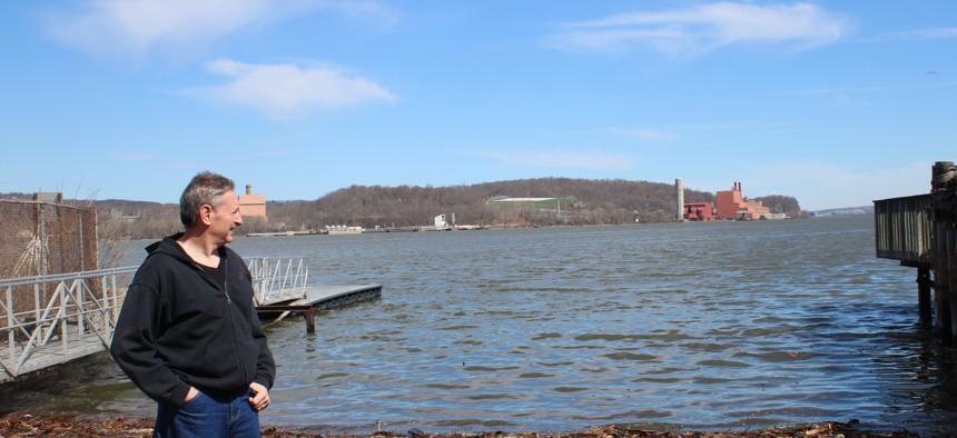 Lou Cicigline, a retired state corrections sergeant, surveys Danskammer from across the Hudson, near his home in the hamlet of Chelsea.