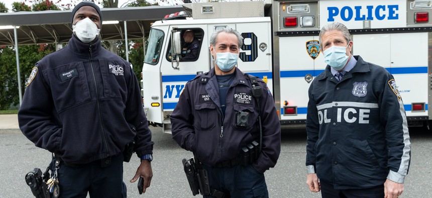 Police Benevolent Association President Pat Lynch, right.