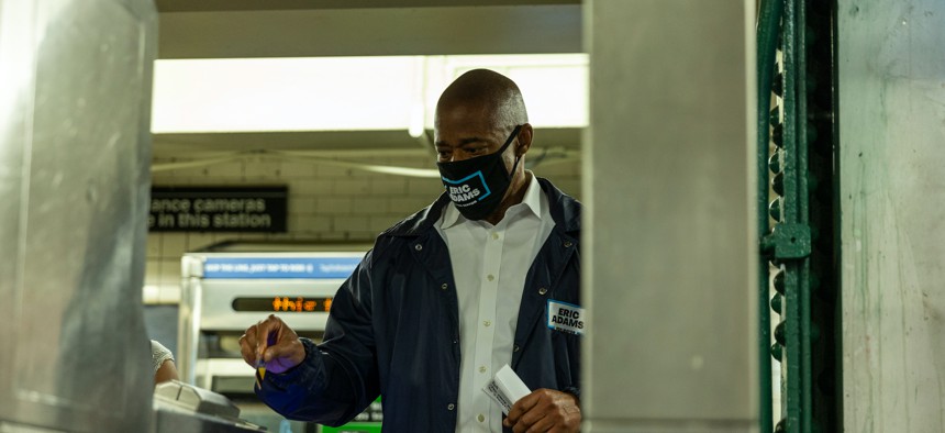 Eric Adams riding the subway on May 18.