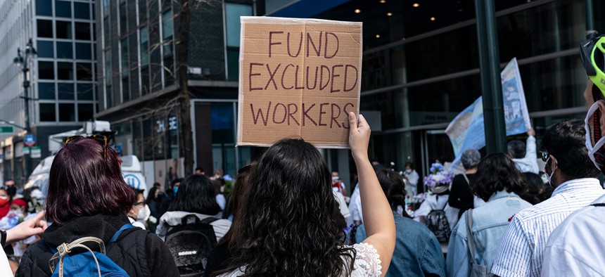 Advocates attend an excluded workers rally on April 4.