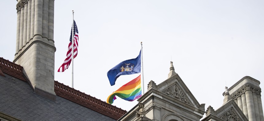 Pride flag flying over the state capitol in Albany.