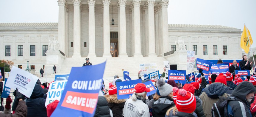 A December 2019 protest against weakening gun laws held outside the Supreme Court.