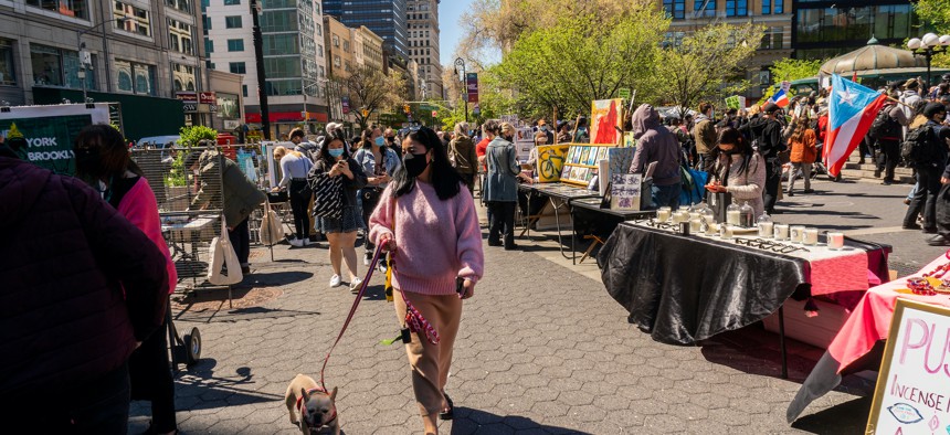 New Yorkers walking around Union Square on May 1.