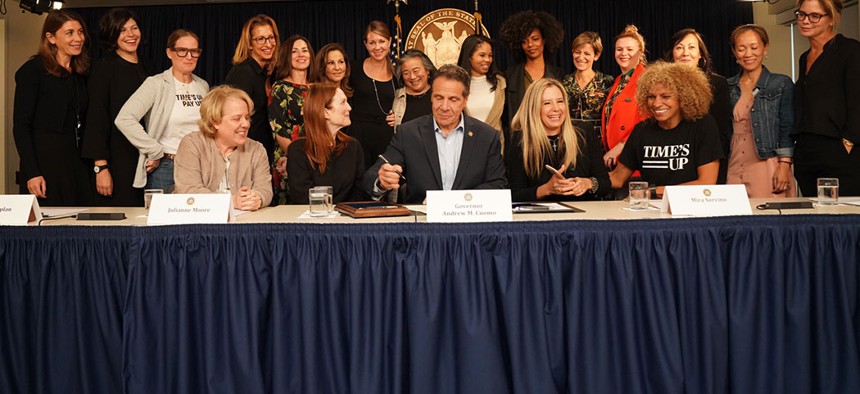 Gov. Andrew Cuomo signs new legislation – sponsored by state Sen. Alessandra Biaggi and Assemblywoman Aravella Simotas – to extend rape statute of limitations in the second and third degree, joined by Times Up leaders.