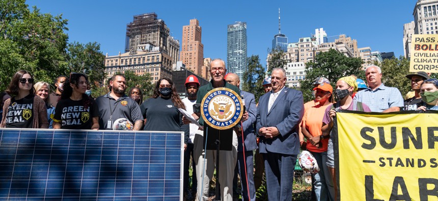 Sen. Chuck Schumer with activists on Sep. 24 calling for a Civilian Climate Corps.
