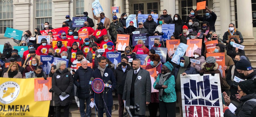 Council Member Ydanis Rodriguez and supporters of the City Council legislation on the steps of City Hall on Dec. 9.