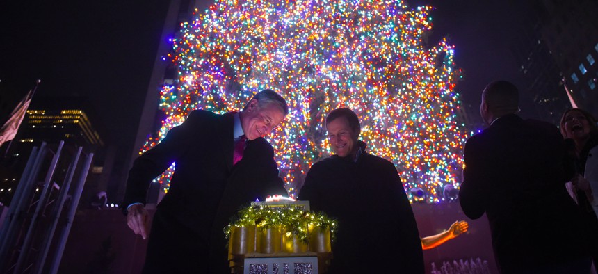 Bill de Blasio lights the tree at Rockefeller Center.