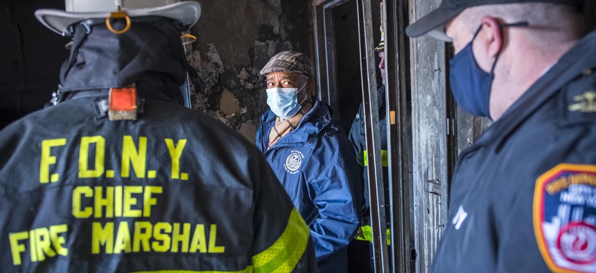 Mayor Eric Adams visits the site of Sunday’s fire in The Bronx. Monday, January 10, 2022.