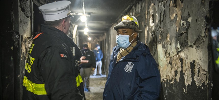 Eric Adams visits the site of the Bronx fire on Jan. 10.