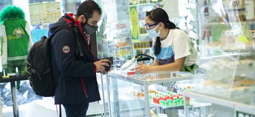 A transaction at a marijuana dispensary in NYC.