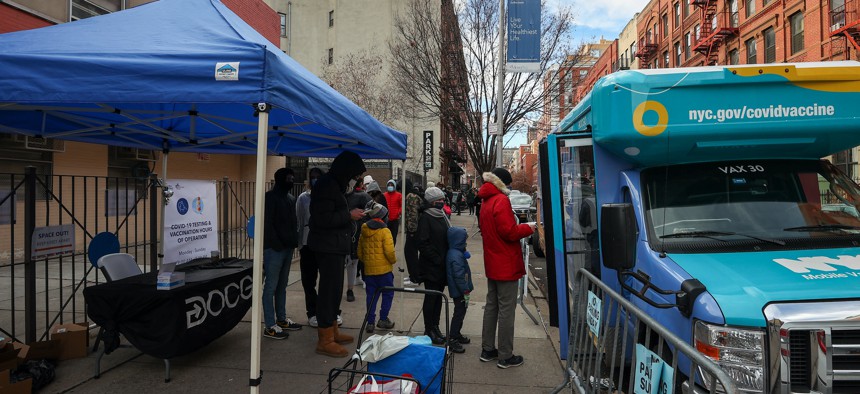 People lining up to get a COVID test in Harlem.