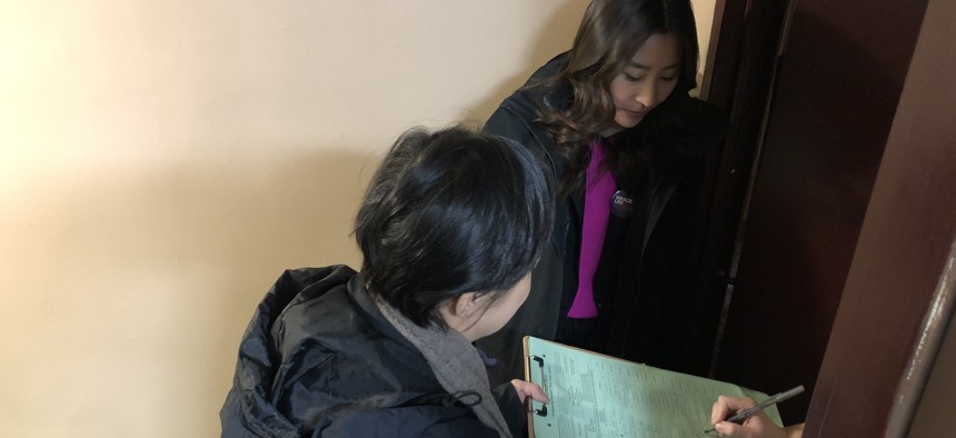 2022 Assembly candidate Grace Lee gathers signatures in lower Manhattan as part of her 2020 Democratic primary campaign.