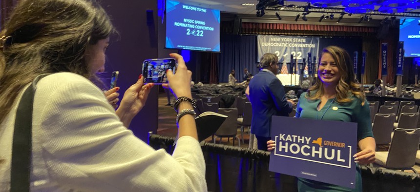 Assembly Member Catalina Cruz of Queens getting her photo taken Thursday by a member of Gov. Kathy Hochul’s campaign team.