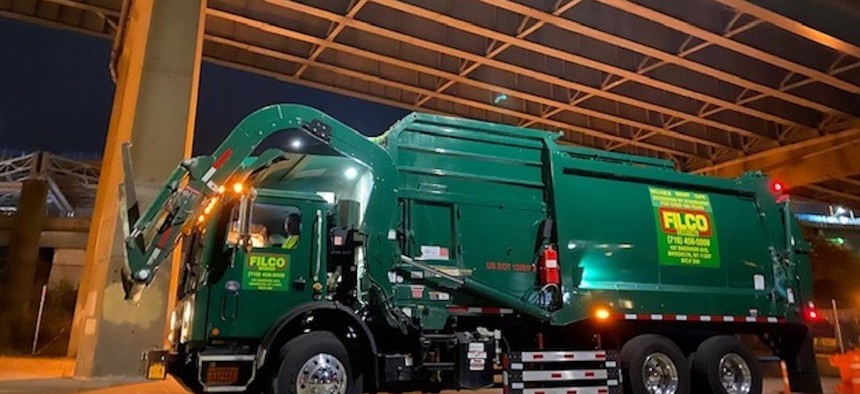 A Filco garbage truck.